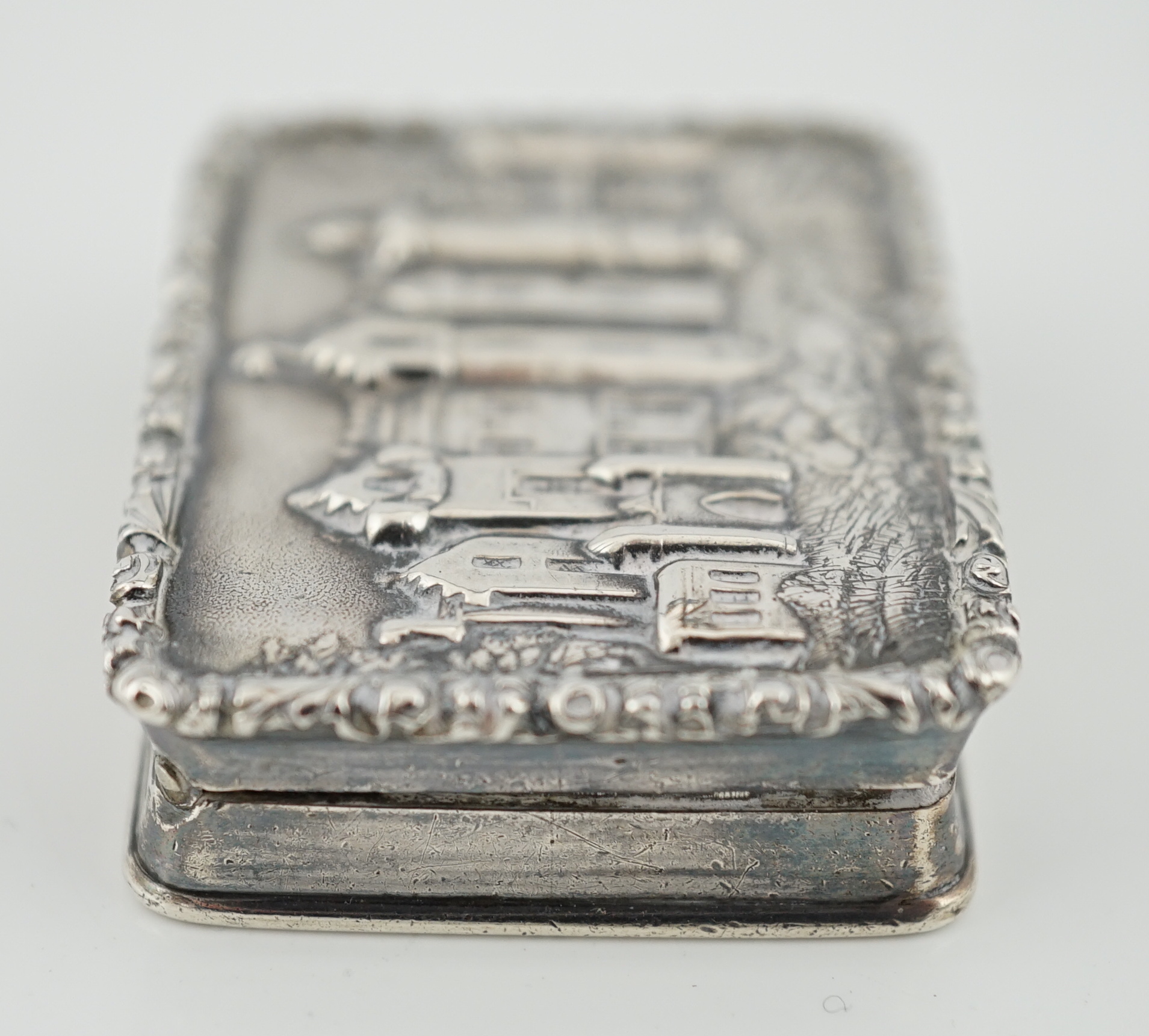 An early Victorian silver rectangular 'castle top' vinaigrette, depicting Abbotsford House, by Edward Smith